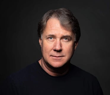 converted-image-Paul-Hennessy-headshot-scaled